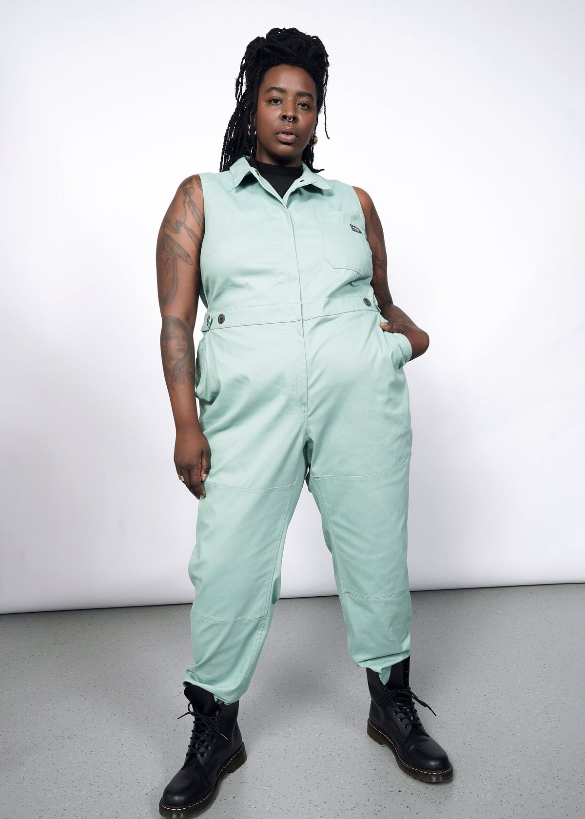Model wearing The Essential Sleeveless High Waisted Coverall in Sage