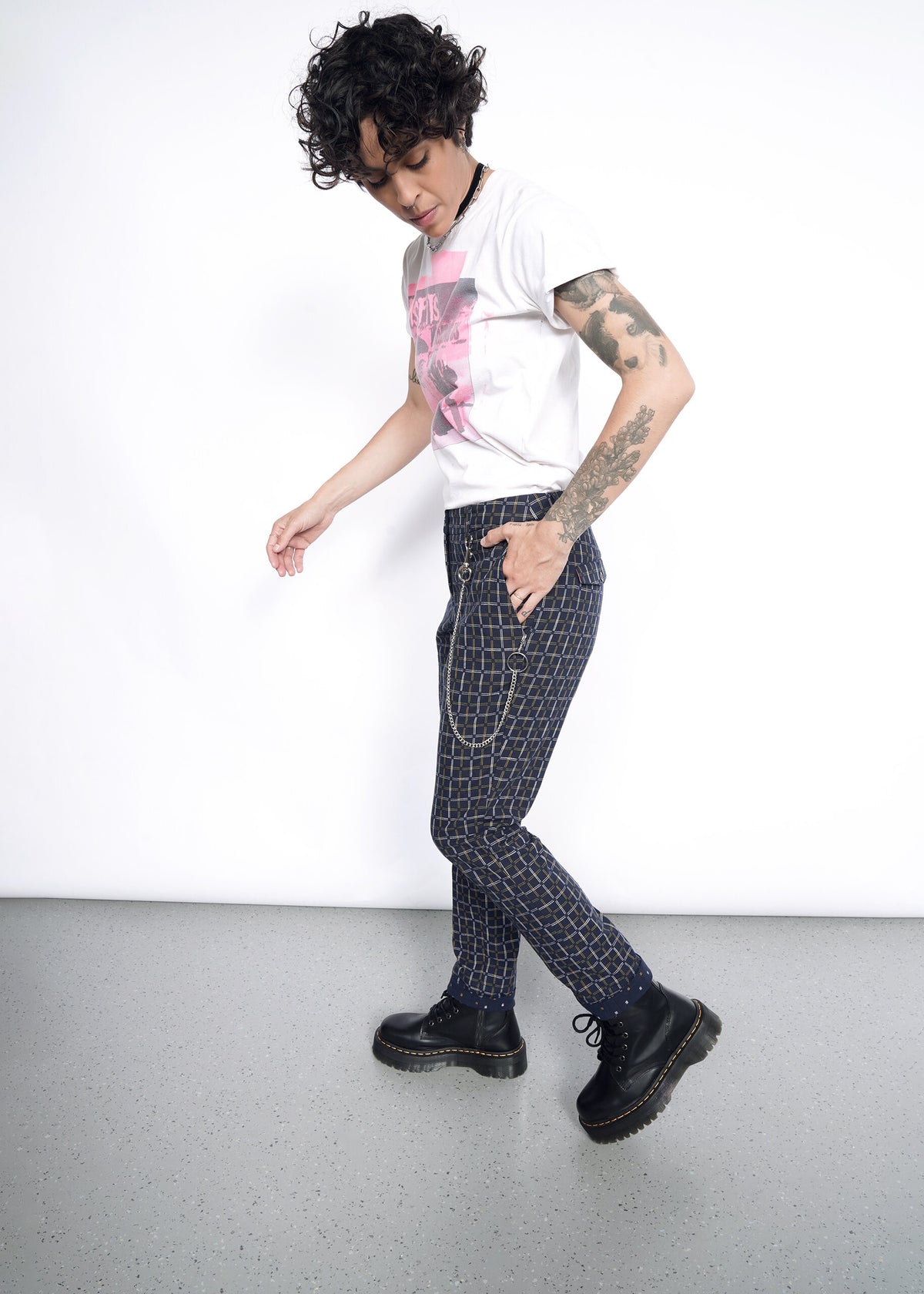 Model wearing The Essential Trouser in Grid Navy