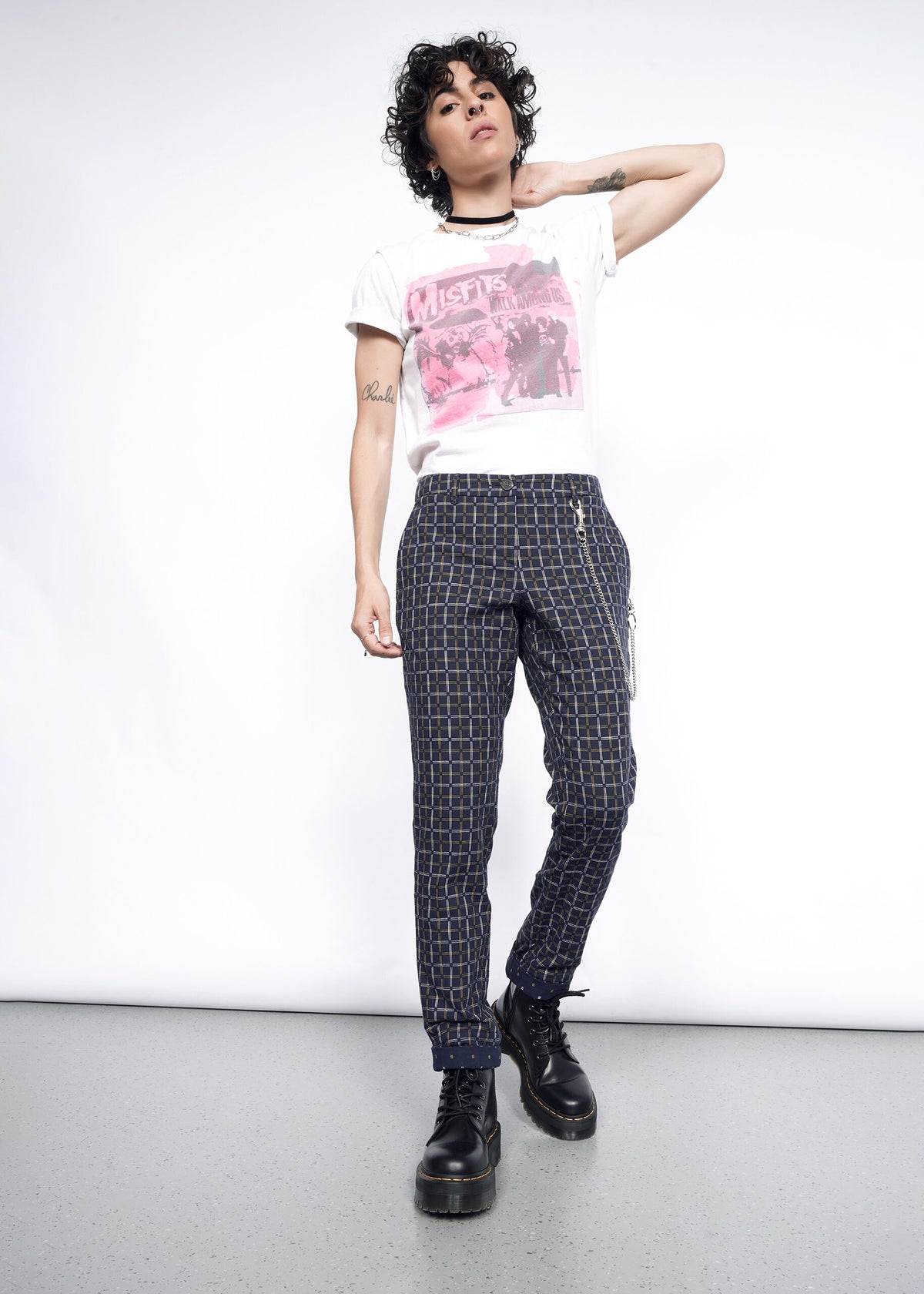 Model wearing The Essential Trouser in Grid Navy