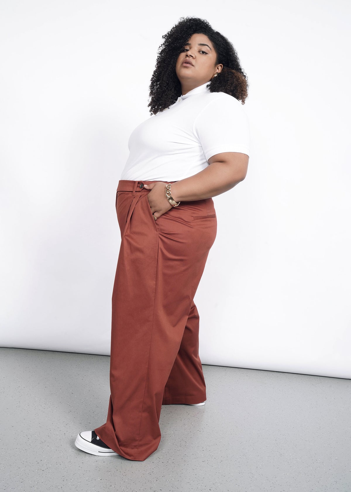 Model wearing The Essential Wide Leg Trouser in Cinnamon