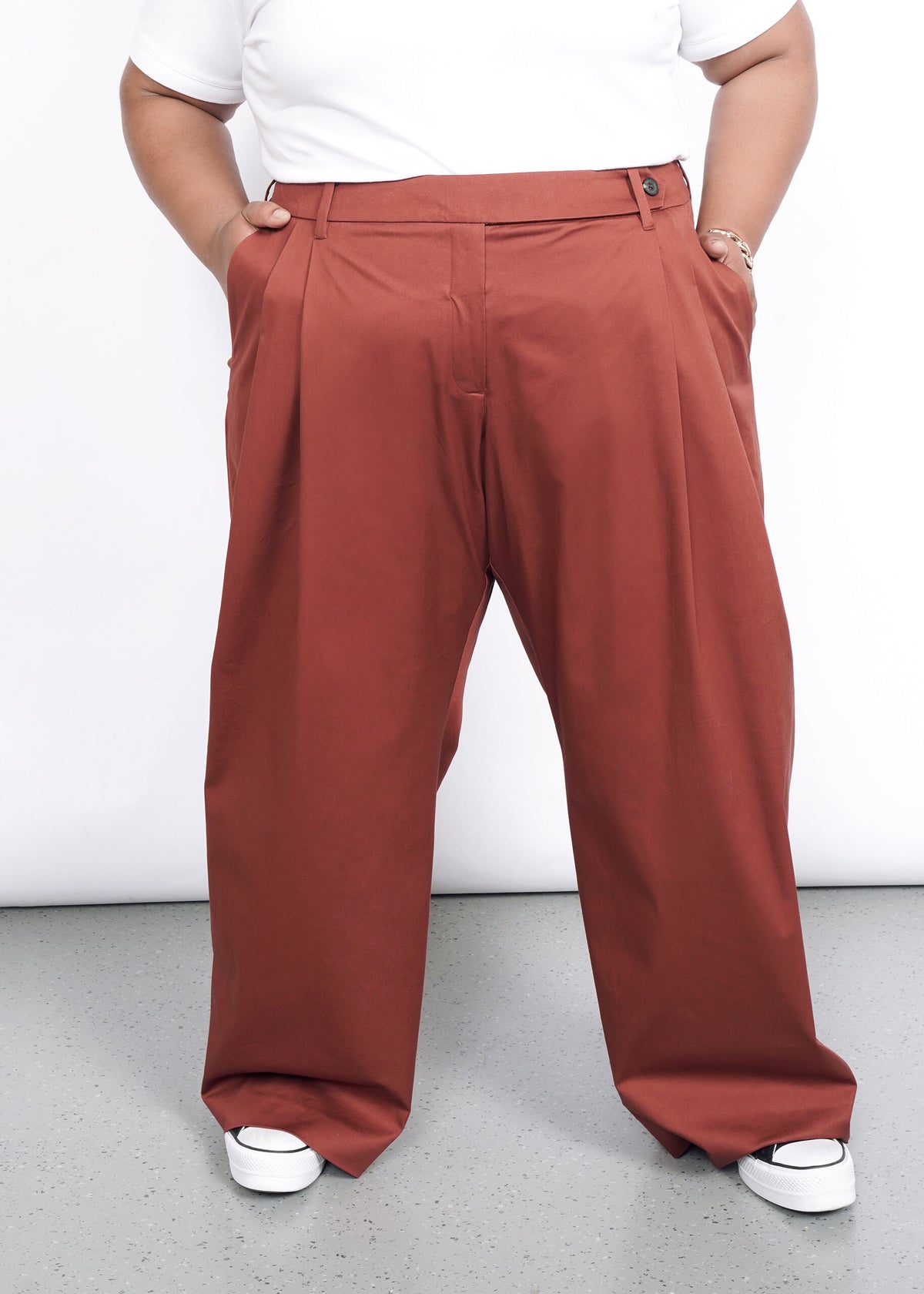 Model wearing The Essential Wide Leg Trouser in Cinnamon