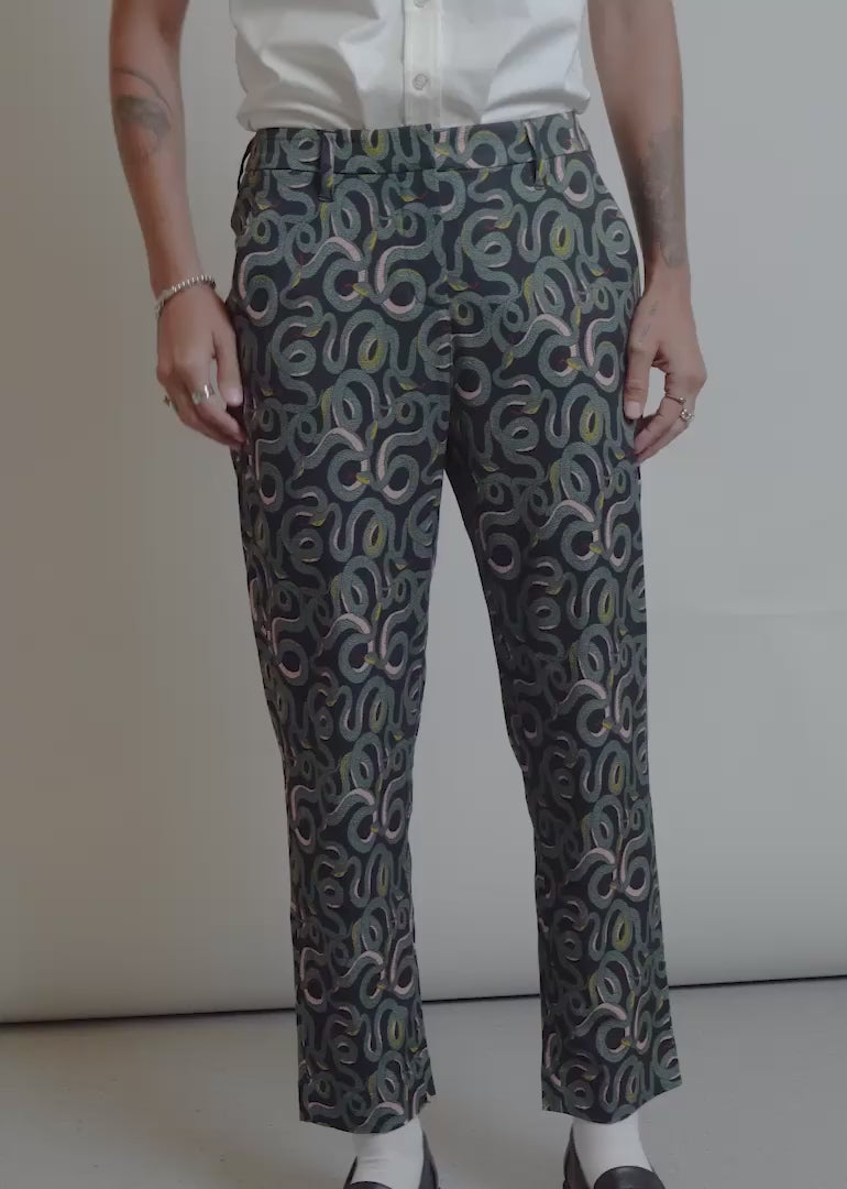 Video shows The Empower Slim Crop Pant in Serpentine on two models of different sizes.