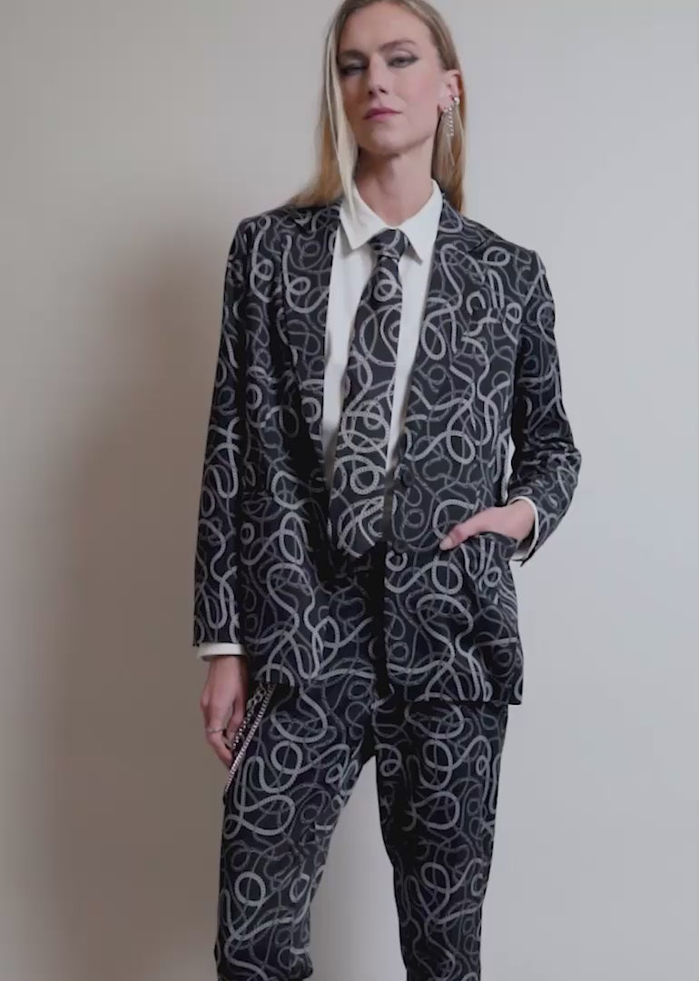 Model shows off the fit and features of the Debbie Harry x Wildfang Notch lapel Blazer