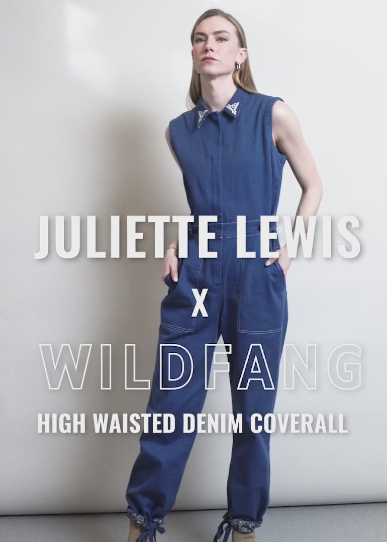 Video showing the fit and features of the Juliette Lewis x Wildfang Sleeveless Denim High Waisted Overall.