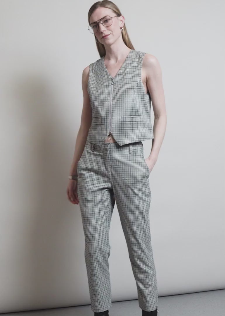 Model showing the fit and features of The Empower Zipper Vest