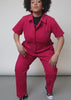 Video shows two models of different sizes wearing The Essential High Waisted Coverall. Video shows close ups of adjustable waist, buttons, zipper, side and back pockets, as well as the stretch of the fabric.