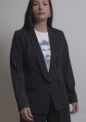 Two models of different sizes showcase the fit and features of The Empower Tux Pinstripe Blazer