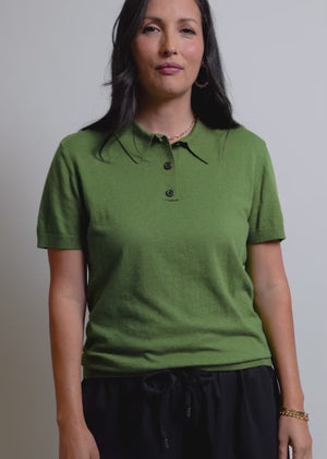 Video of two models wearing The Everyday Polo Sweater in Moss Green and showing the fit and features