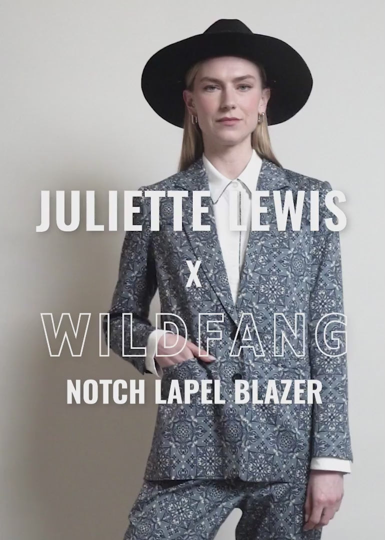 Video showing person modeling and showing the fit and featured of The Juliette Lewis x Wildfang Notch Lapel Blazer.