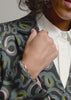 Video showing The Empower Double Breasted Blazer in snake Serpentine print.Video shows product on 3 different sized models showcasing each unique feature of the product including double breasted closure, stretch, soft material, ad deep pockets.