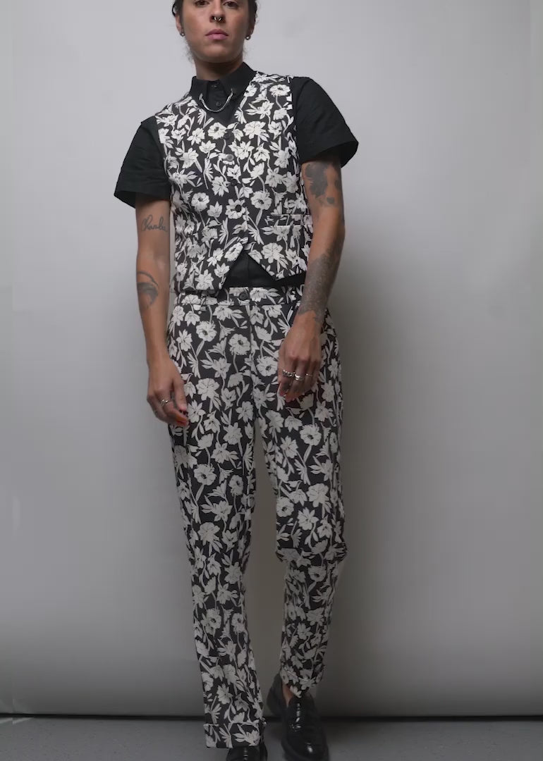 Model wearing The Empower Trouser in Monochrome Floral shows the fit and features of the pant.