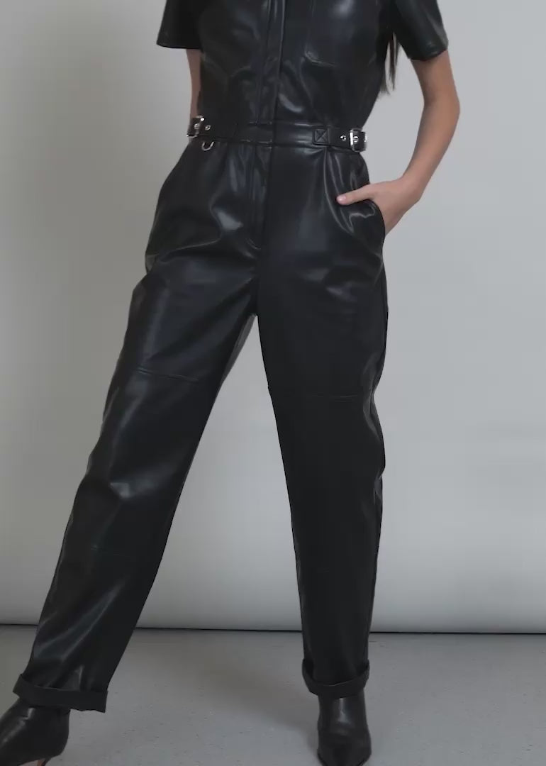 Video of two models wearing The Debbie Harry x Wildfang Vegan Leather Coverall and showing the fit and features