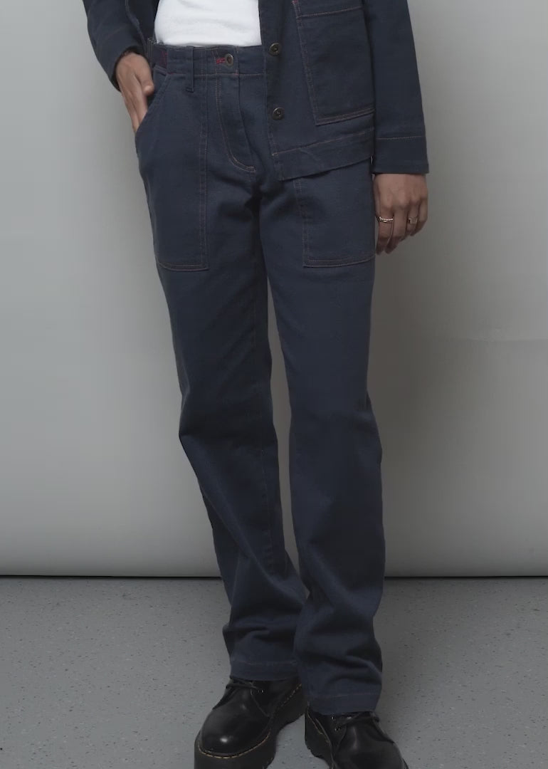 Model shows fit and features of The Essential Denim Utility Pant