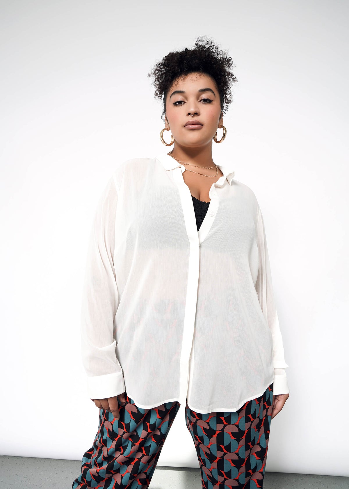 The Empower Sheer Long Sleeve Button Up in White